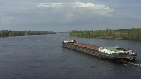 Copter flying over an empty barge with a Russian flag Stock Footage 155184819