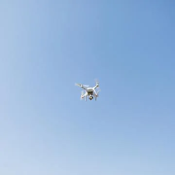 Copter with high resolution digital camera in the sky Stock Photos