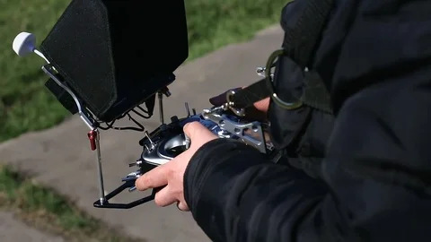 The Copter pilot controls the copter on the control panel. 스톡 동영상 75862643