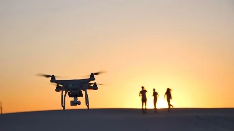 Copter at sunset in the desert Stock Footage 80095282