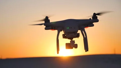 Copter at sunset in the desert Stock Footage 80095355