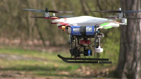 Copter\drone with camera  fly in  spring wood close up Stock-Footage 37296501