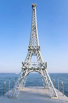 A copy of the Paris Eiffel tower on the seashore Stock Photos