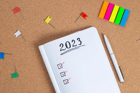 Copy space for 2023 Goals in notebook plan listing of new year goals Stock Photos