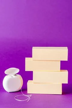 Copy space on background with dental floss and empty block, healthy oral co.. Stock Photos