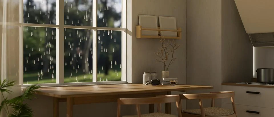 Copy space on a dining table against the window on a rainy day, in a modern.. Illustrazione stock
