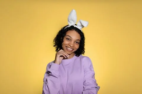 Copy space easter banner with happy smiling sfrican american girl in eater bunny Stock Photos