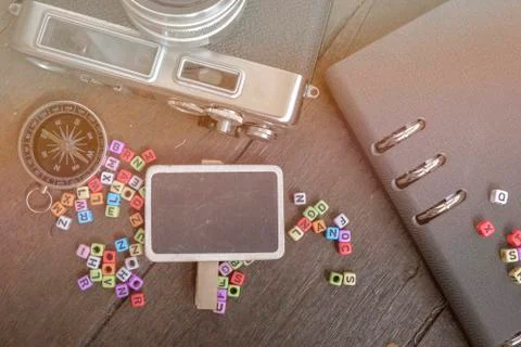 Copy space of flat lay composition of vintage camera,compass, planner book an Foto stock