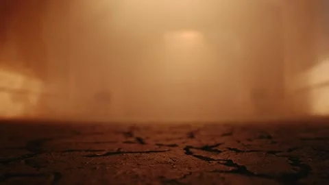 Copy space low angle close-up of cracked floor in foreground and atmospheric Stock Footage 289799029