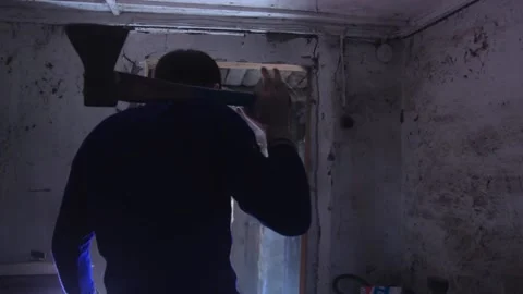 Copy space. A man with an axe was standing and breathing deeply. Rear view Stock-Footage 136051943