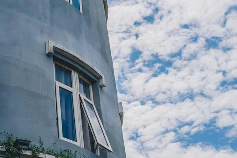 Copy space side gray wall round building tower stylized Middle Age. Modern Stock Photos
