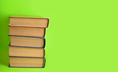 Copy space, stack of retro books on a green background... Copy space, stack o 写真素材