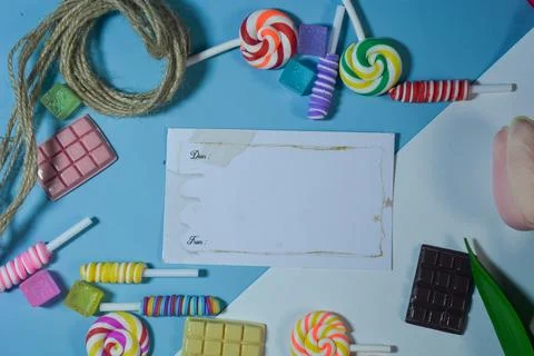 Copy space template with candy, chocolate and lollipop elements Stock Photos