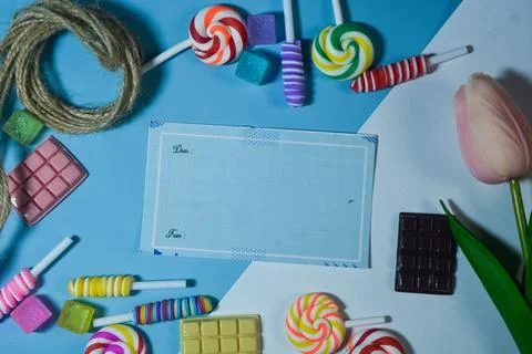 Copy space template with candy, chocolate and lollipop elements Stock Photos