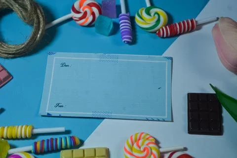 Copy space template with candy, chocolate and lollipop elements Stock Photos