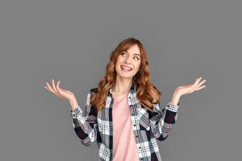 Copy Space for Text or Product . Stylish woman studio standing isolated on grey Stock Photos