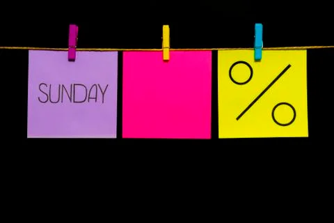 Copy space. Three stickers. On the left lilac sheet inscription Sunday. In the 스톡 사진