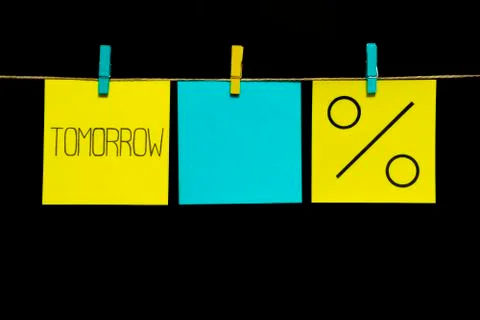 Copy space. Three stickers. On the left yellow sheet inscription tomorrow. In Stock Photos
