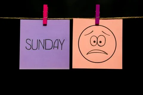 Copy space. Two multicolored stickers. On left a sheet inscription sunday. On Stock Photos