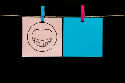Copy space. Two stickers. On gray page on the face is an expression of gaiety. Stock Photos