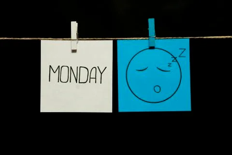 Copy space. Two stickers. Left on a white sheet inscription monday. On the right Фото
