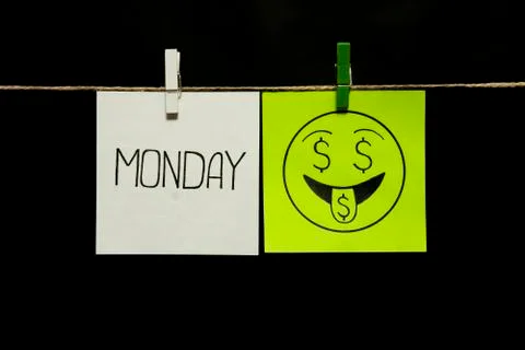 Copy space. Two stickers. Left on a white sheet inscription monday. On the Stock Photos