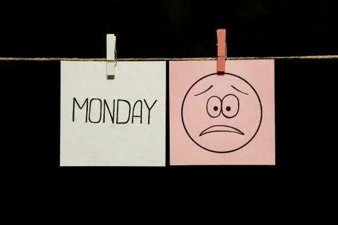Copy space. Two stickers. Left on a white sheet inscription monday. On right Stock Photos