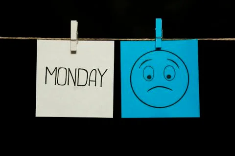 Copy space. Two stickers. Left on a white sheet inscription monday. On right Stock Photos