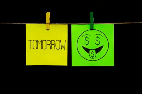 Copy space. Two stickers. Left on sheet inscription tomorrow. On the green right Foto stock