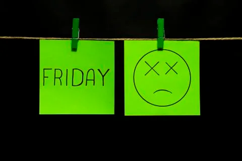 Copy space. Two stickers. On left a sheet inscription friday. On the right on Photos