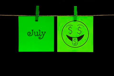 Copy space. Two stickers. On the left sheet inscription July. On the green right Stock Photos