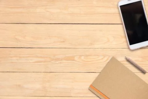 Copy space of working desk, mobile phone, book, penceil Stock Photos