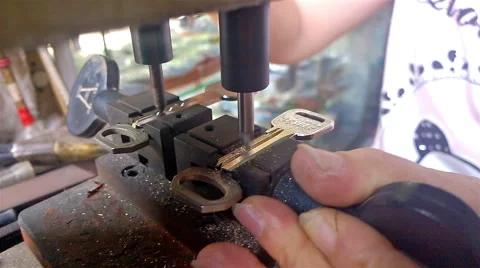 Copying a key by a key machine Stock Footage 53462706