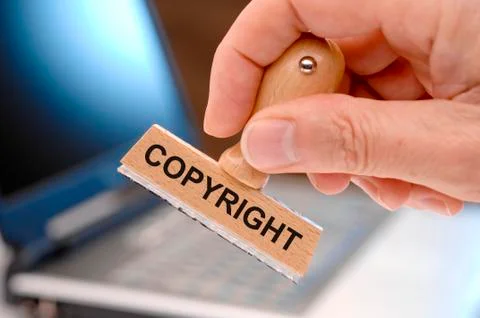 Copyright printed on rubber stamp Stock Photos