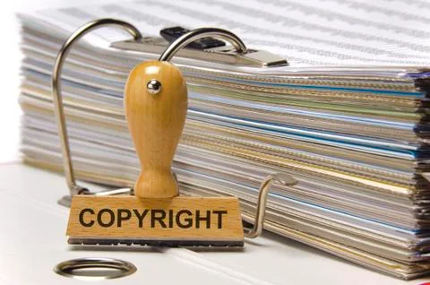 Copyright printed on rubber stamp Stock Photos