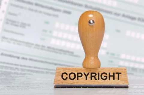 Copyright printed on rubber stamp Stock Photos