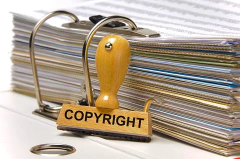 Copyright printed on rubber stamp Stock Photos
