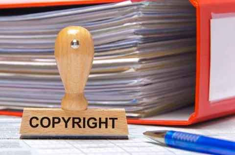 Copyright printed on rubber stamp Stock Photos