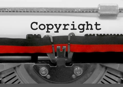 Copyright text written by an old typewriter on white sheet Фото