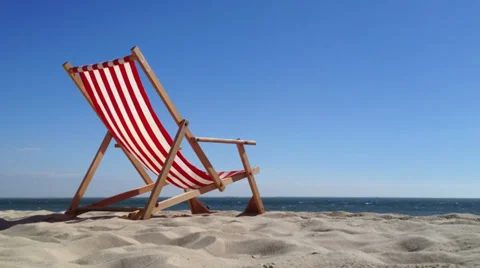 Copyspace deck chair at the beach with space for text in summer Stock-Footage 28841355