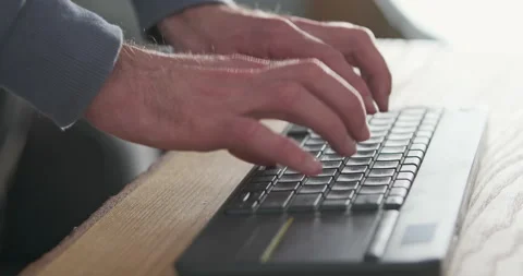 Copywriter typing text on keyboard, close-up, side view. Standing work. Concept Stock Footage 237687236