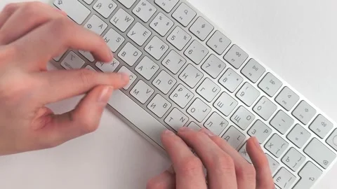 Copywriting process on a desktop computer keyboard viewed from a top down a.. Stock Footage 346632591