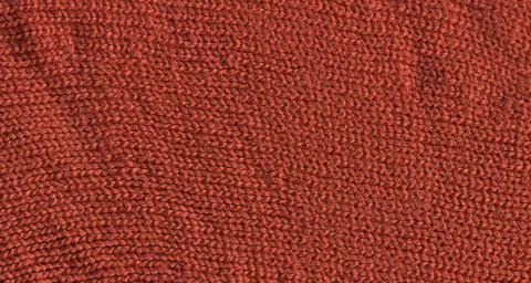 Coquelicot cloth backdrop with textured effect with copy space 库存照片