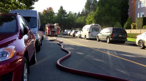 Coquitlam fire emergency personnel in rescue action. Stock Footage