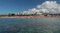 Coral Bay beach from sea. People sunbathing and swimming. Peyia, Paphos, Cyprus HD Footage
