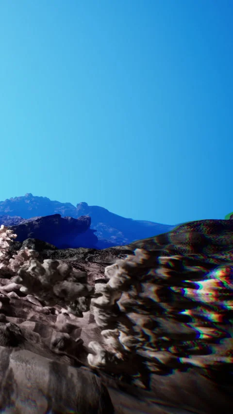 Coral reef under clear blue sky with rocky landscape at midday Stock Footage 339032688