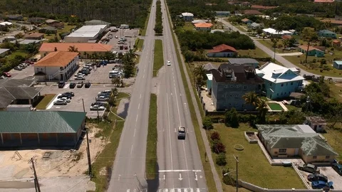 Coral Road Highway Corridor Through Freeport, Grand Bahama Drone View Stock Footage 88992054