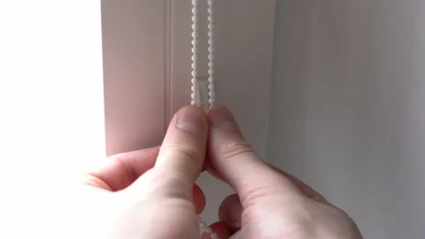 Cord attachment for blinds on windows Stock Footage 154926393