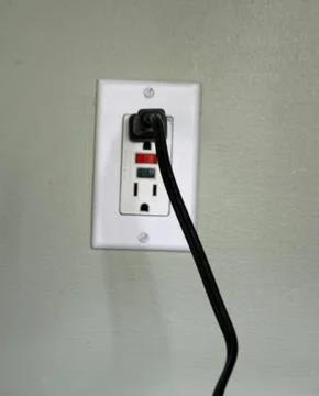 Cord Plugged In Stock-Fotos