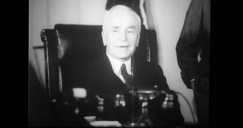 Cordell Hull talking to diplomats in office Stock Footage